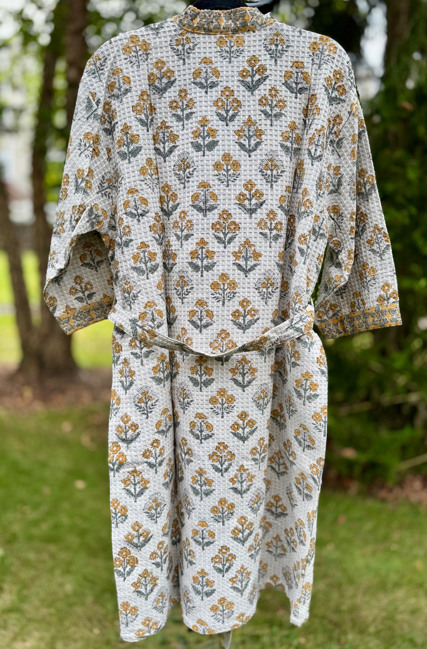 House of Mulmul - cotton bath robe. Floral gray patterned robe with yellow flowers on a green background.
