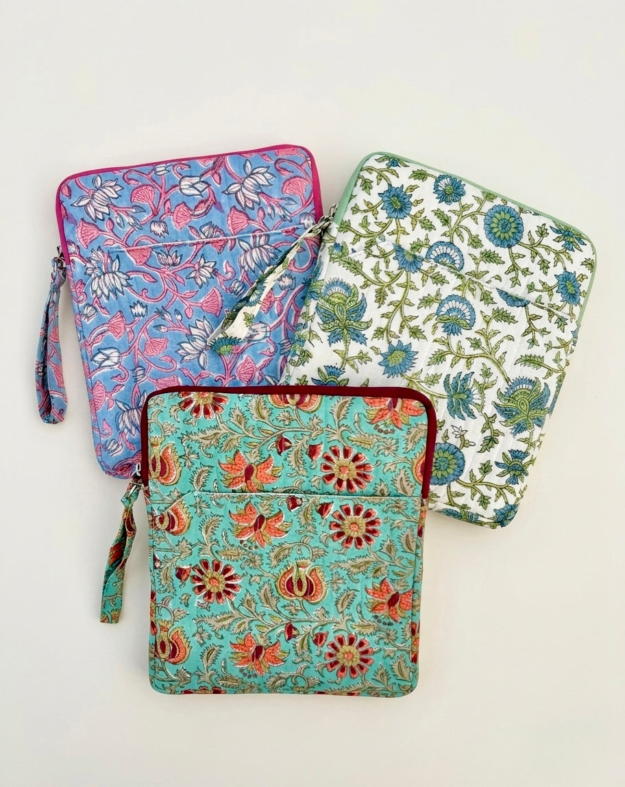 House of Mulmul - Blockprinted iPad Sleeve Cover. Floral-patterned iPad sleeves on a white background