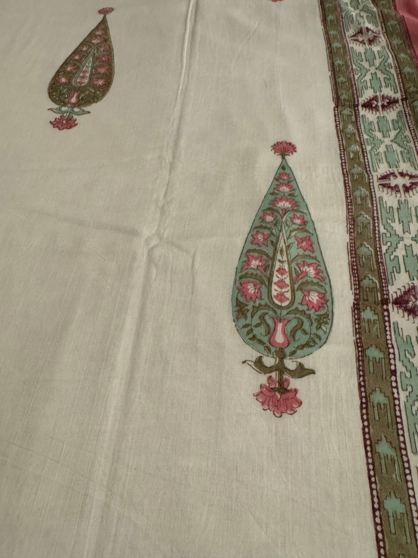 House of Mulmul - Coverlet Dohar, cotton blanket, muslin blanket, mulmul dohar. Embroidered fabric with floral patterns on a beige background