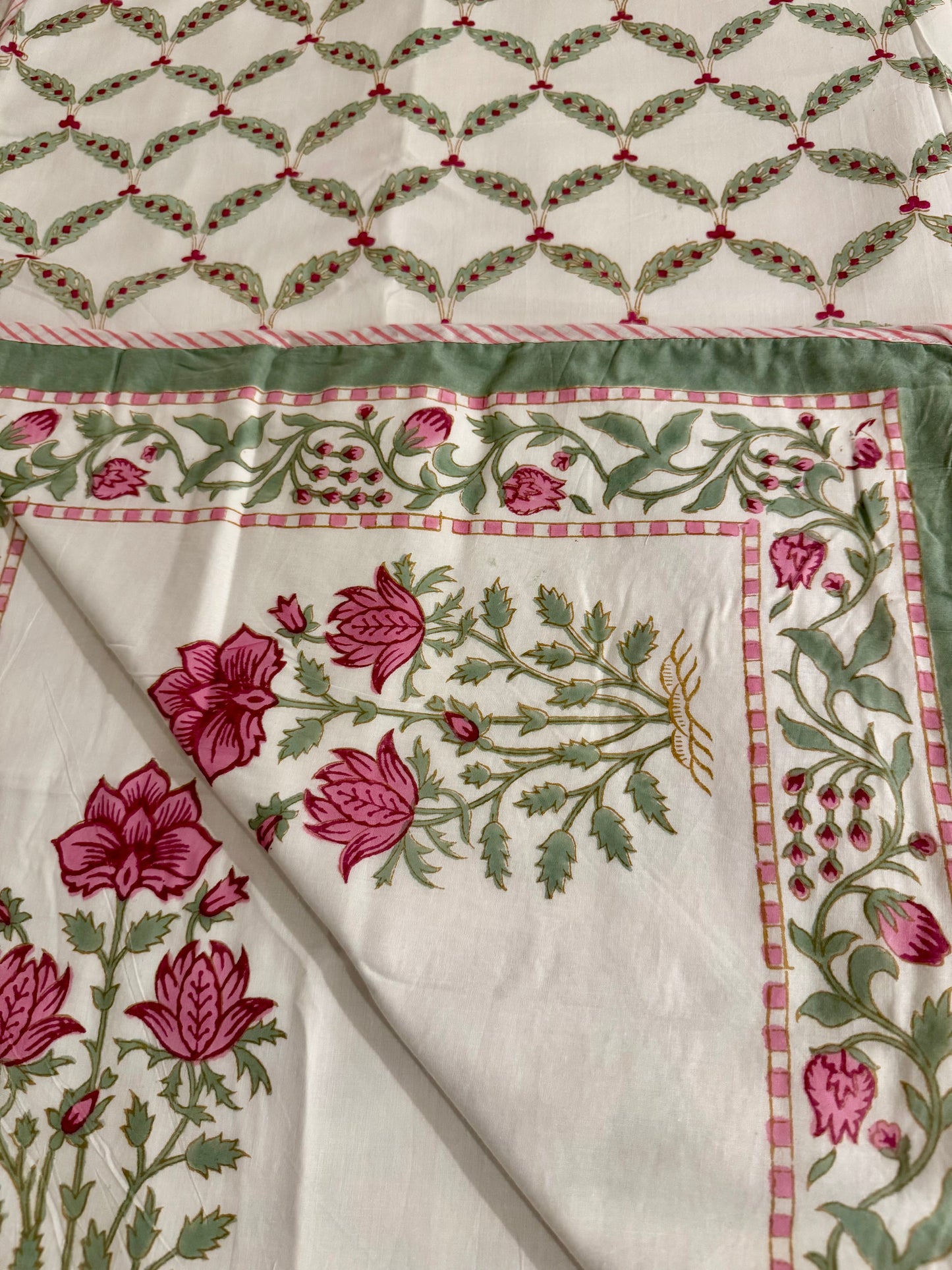 House of Mulmul - Coverlet Dohar, cotton blanket, muslin blanket, mulmul dohar. Decorative handblock printed fabric with floral and geometric patterns on a white background.