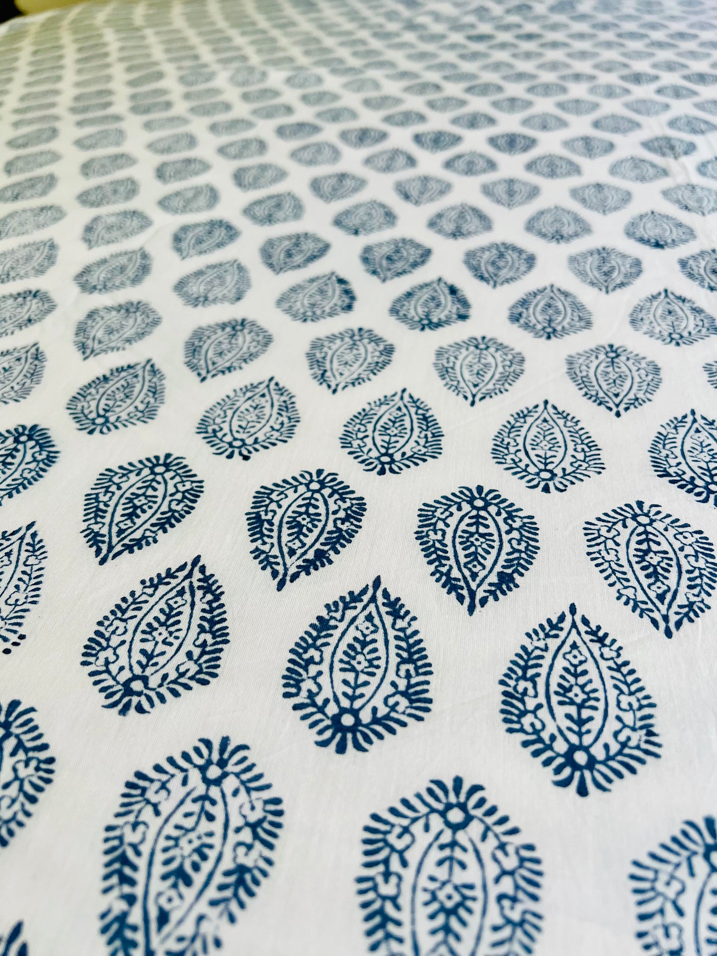 House of Mulmul - Cotton Coverlets (Dohar). Patterned fabric with blue designs on a white background