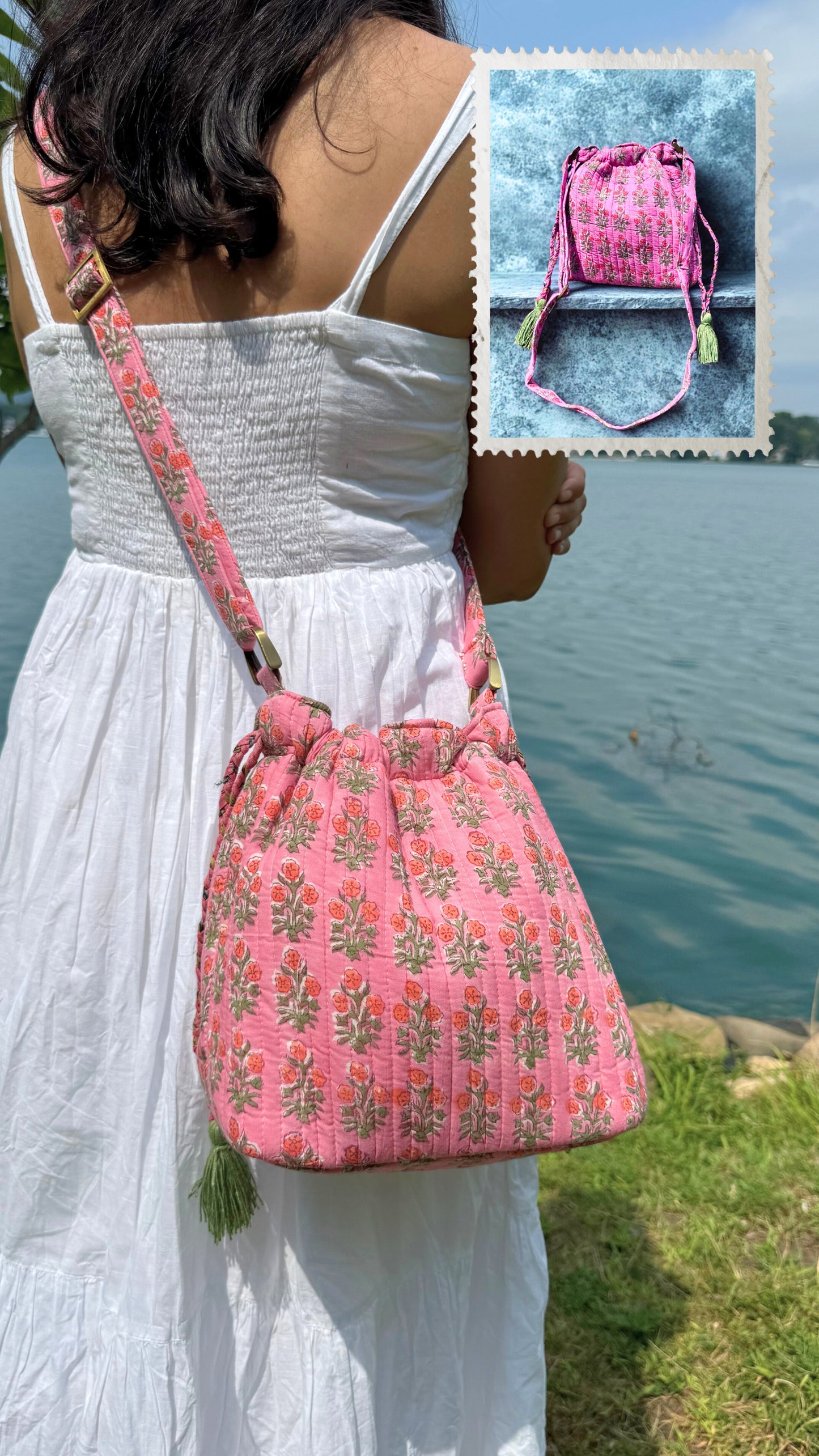 House of Mulmul - Garden Wayfarer Bucket Bag, Cotton bag, Crossbody sling bag. Woman holding a pink floral handbag by a body of water