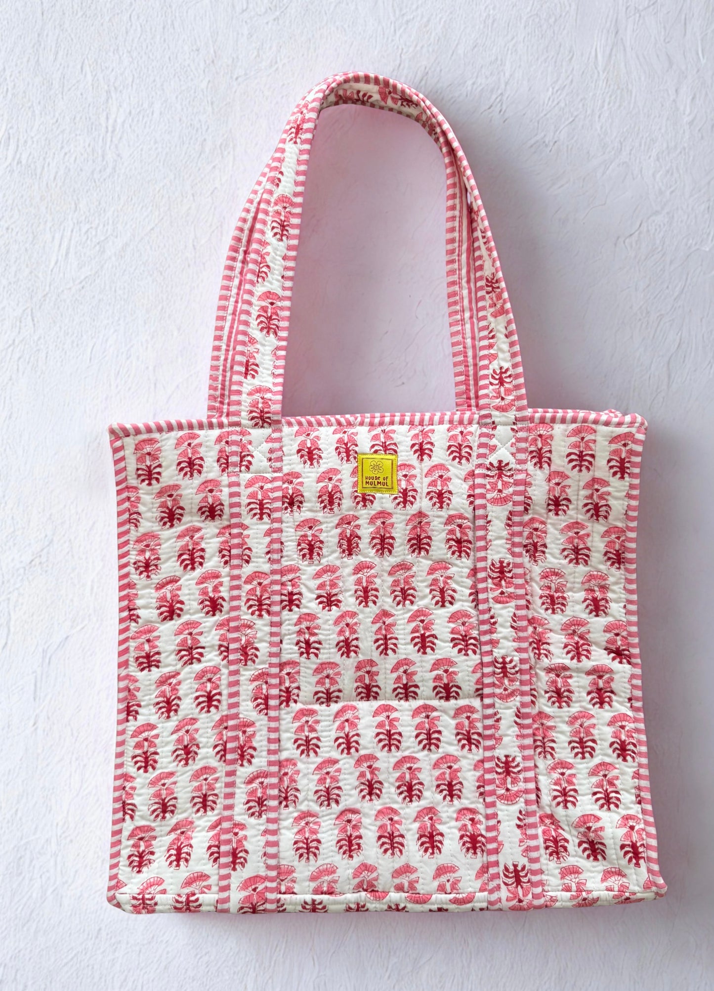 House of Mulmul - Cotton Tote Bag. Pink Red and white patterned tote bag on a light gray background