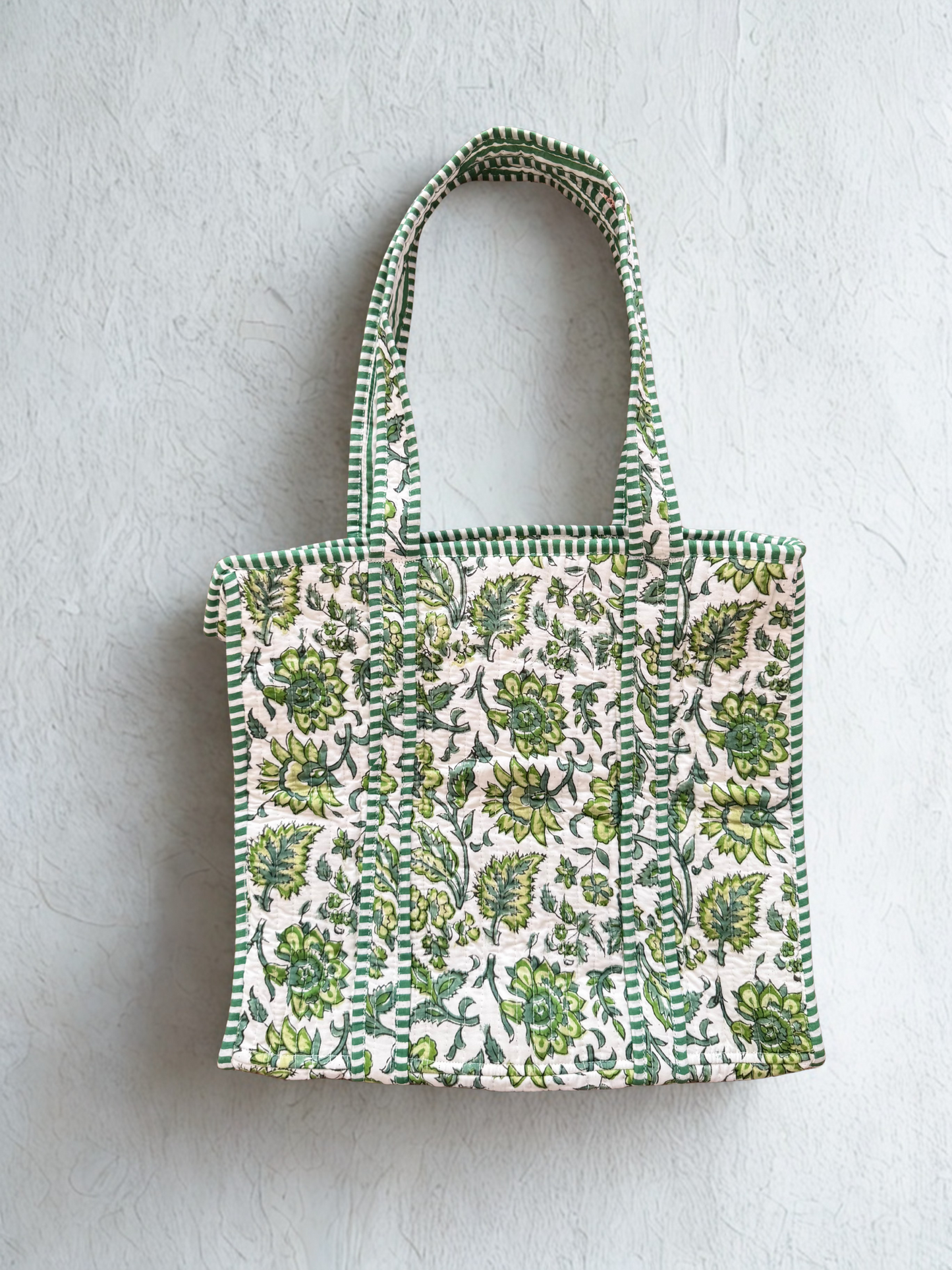 House of Mulmul - Cotton Tote Bag. Green and white patterned tote bag on a light gray background