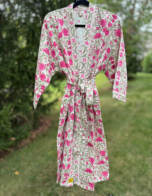 House of Mulmul - cotton bath robe. Floral patterned robe with pink flowers on a green background.