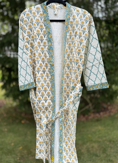House of Mulmul - cotton bath robe. Floral and geometric patterned robe with yellow flowers and teal blue colors.