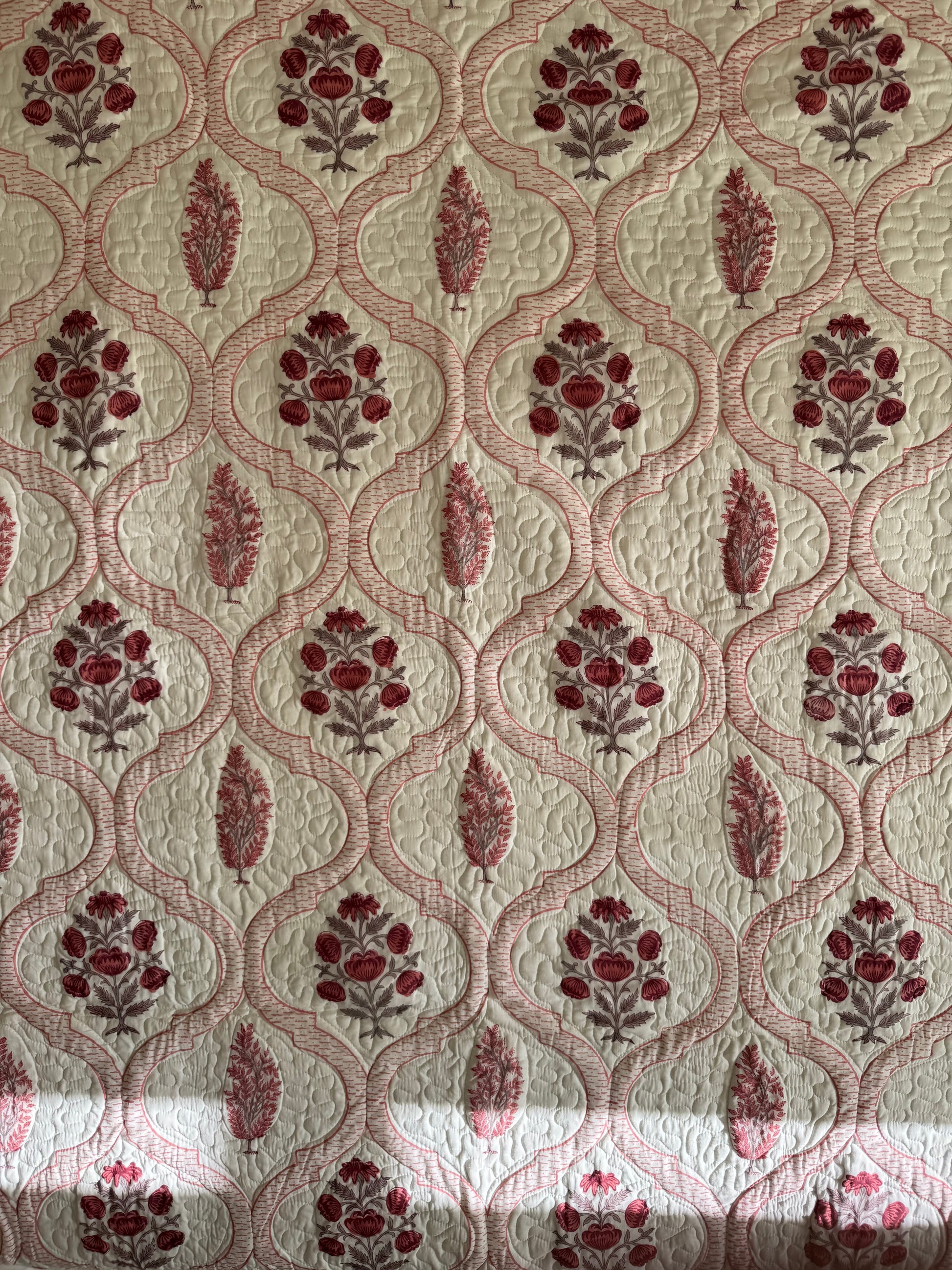 House of Mulmul - Blockprinted Cotton Bedcover Reversible Muslin. Patterned bedcover with red floral design on a beige background