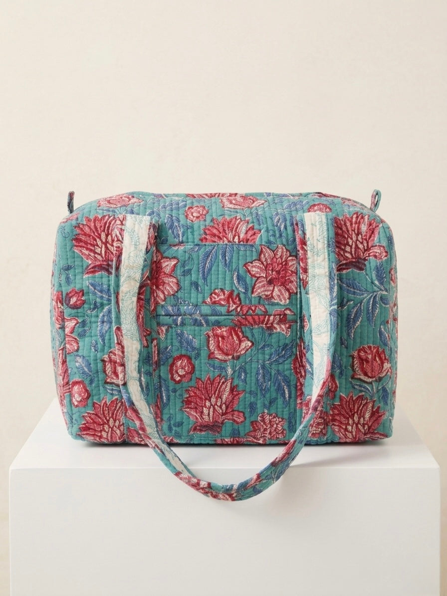 House of Mulmul - Blockprinted Cotton Duffle Bag Weekender Bag. Floral patterned duffle bag on a white background.