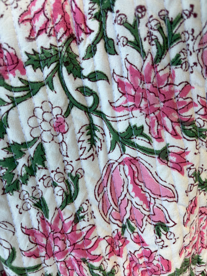 House of Mulmul - Blockprinted Cotton Duffle Bag Weekender Bag. Floral patterned fabric with pink flowers and green leaves on a white background