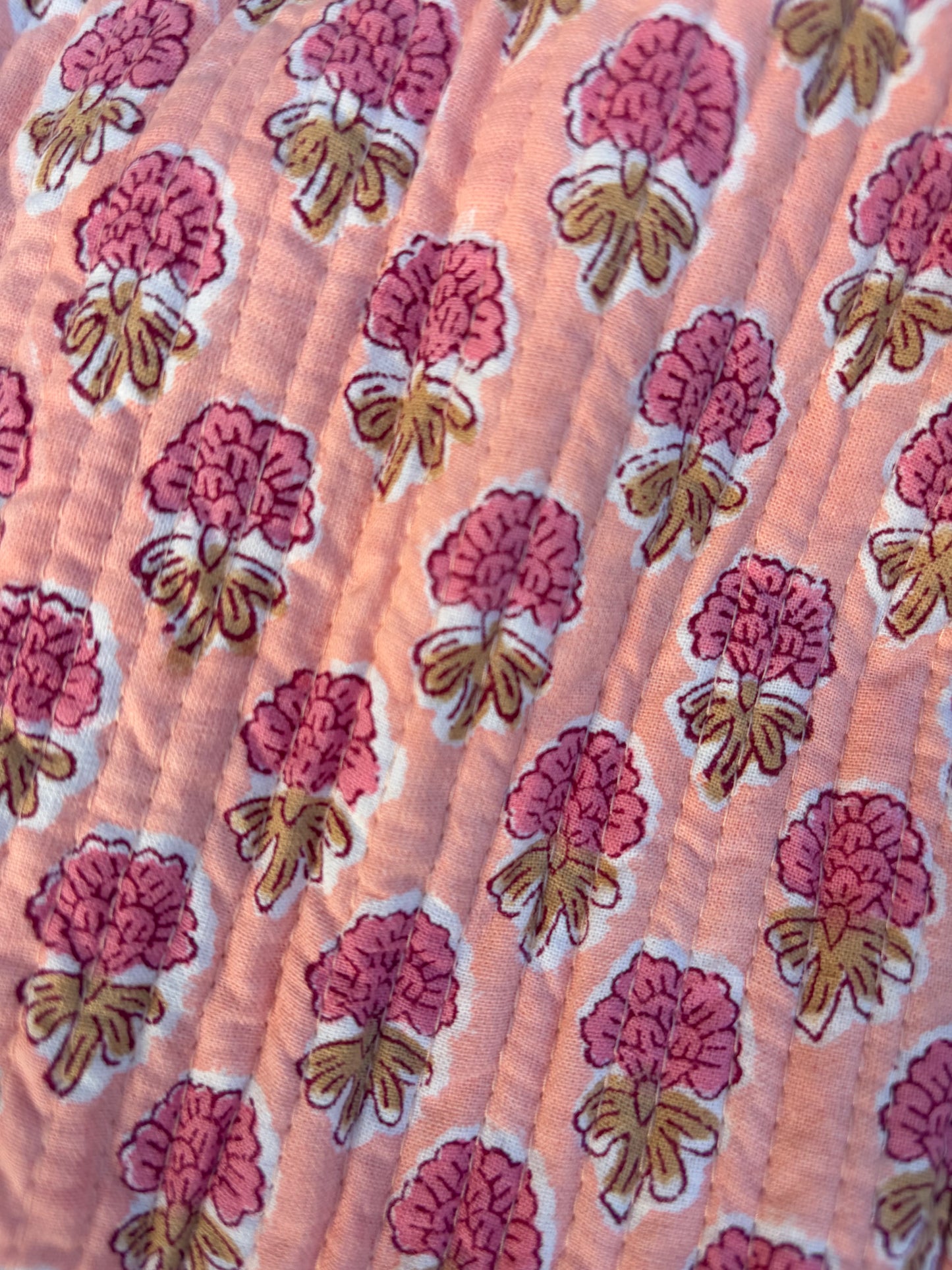 House of Mulmul - Blockprinted Cotton Duffle Bag Weekender Bag. Patterned fabric with pink floral design on a pink background