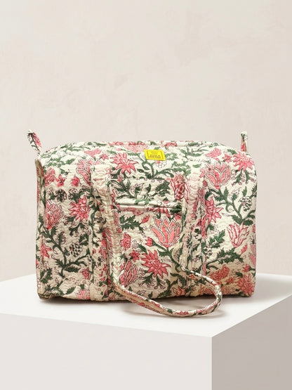 House of Mulmul - Blockprinted Cotton Duffle Bag Weekender Bag. Floral-patterned bag with a visible brand logo on a white background