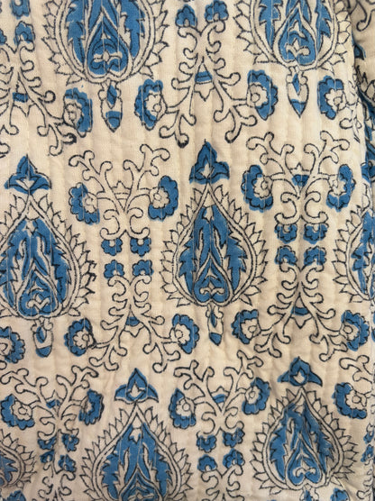 House of Mulmul - Blockprinted Cotton Duffle Bag Weekender Bag. Close-up of fabric with blue and beige paisley pattern