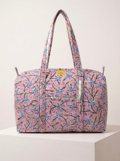 House of Mulmul - Blockprinted Cotton Duffle Bag Weekender Bag. Floral patterned bag on a light background