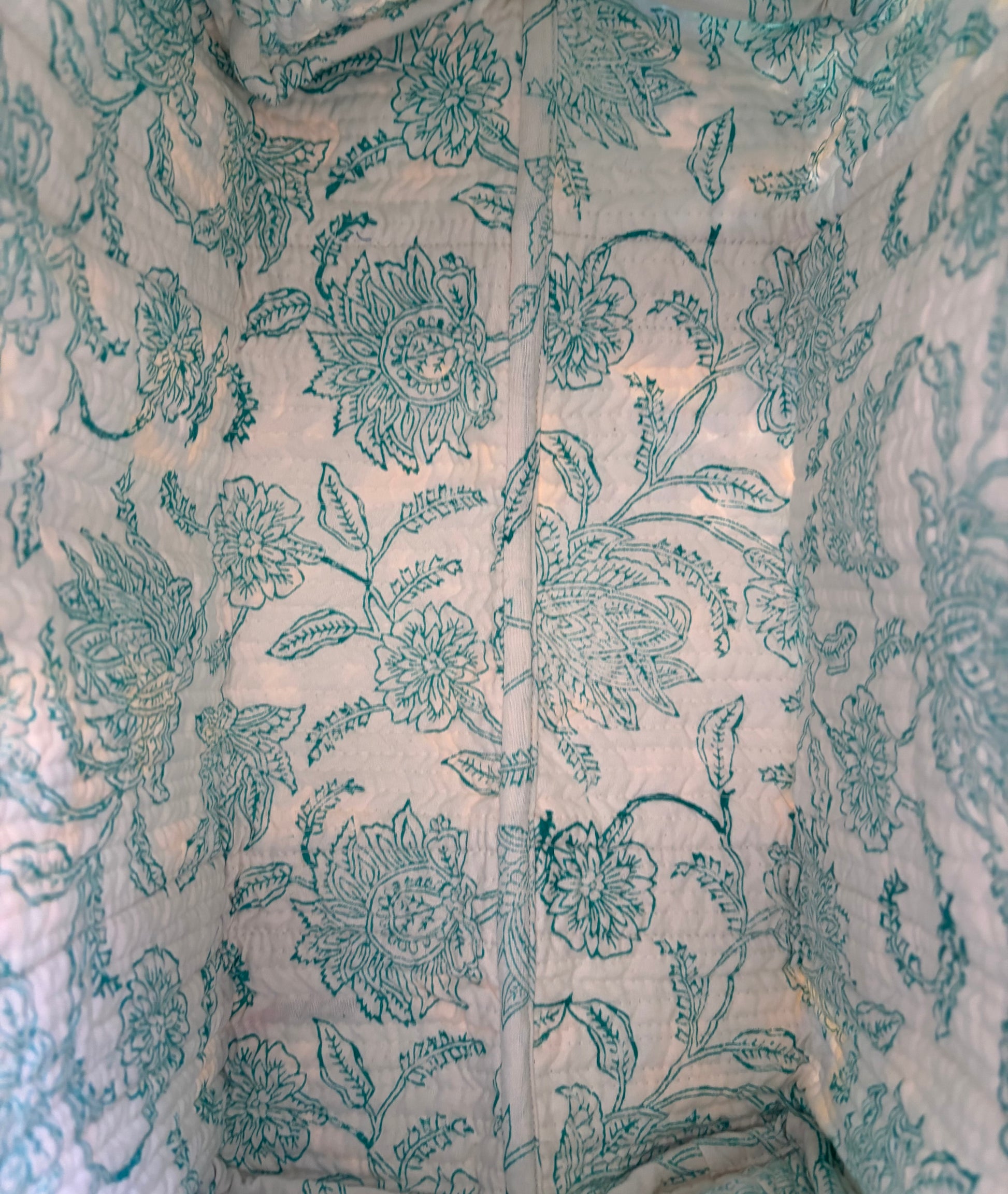 House of Mulmul - Blockprinted Cotton Duffle Bag Weekender Bag. Floral patterned fabric with green flowers on a light background.