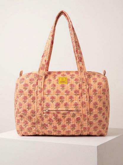 House of Mulmul - Blockprinted Cotton Duffle Bag Weekender Bag. Floral patterned handbag on a white background