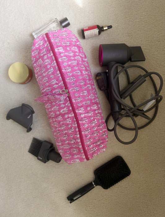 House of Mulmul - Blockprinted Cotton Hair Tool Bag. Pink hair styling Dyson hair dryer straightener kit with tools on a beige surface