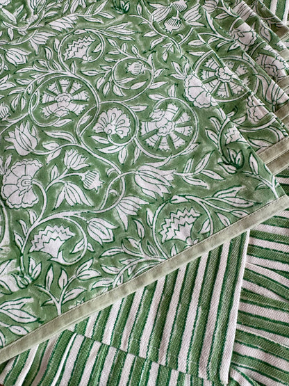 House of Mulmul - Blockprinted Cotton Placemats and Napkins. Green napkins with white floral pattern and striped border