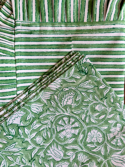 House of Mulmul - Blockprinted Cotton Placemats and Napkins. Green and white striped mats and napkins with a floral patterned fabric
