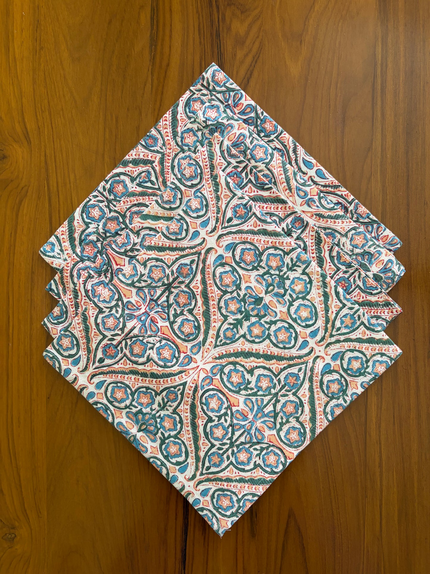 House of Mulmul - Blockprinted Cotton Table Napkins. Patterned table napkins fabric on a wooden surface