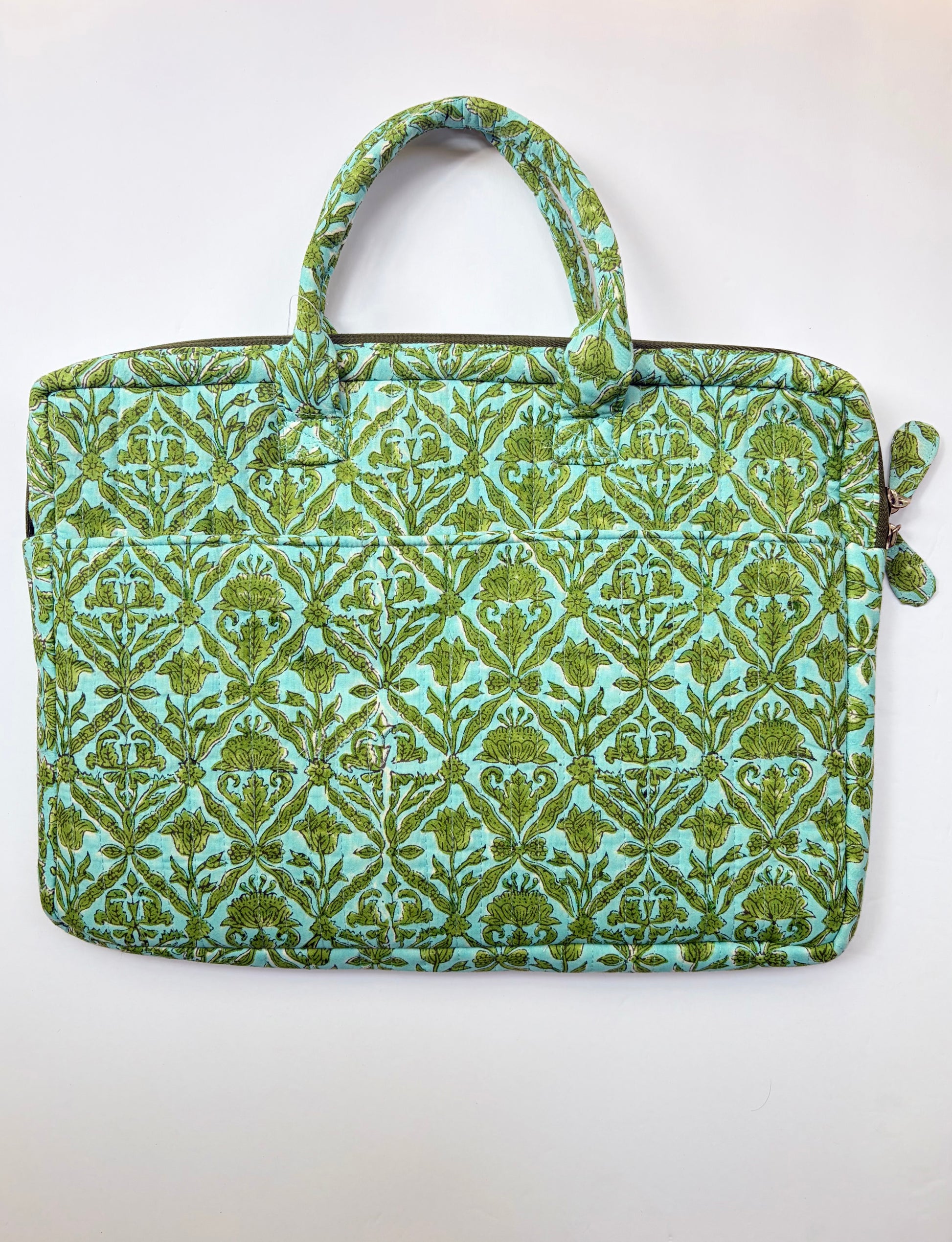 House of Mulmul - Blockprinted Cotton Quilted Laptop Bag. A quilted laptop sleeve featuring a green and turquoise damask pattern, with top handles and a zippered side pocket, shown against a plain white background.