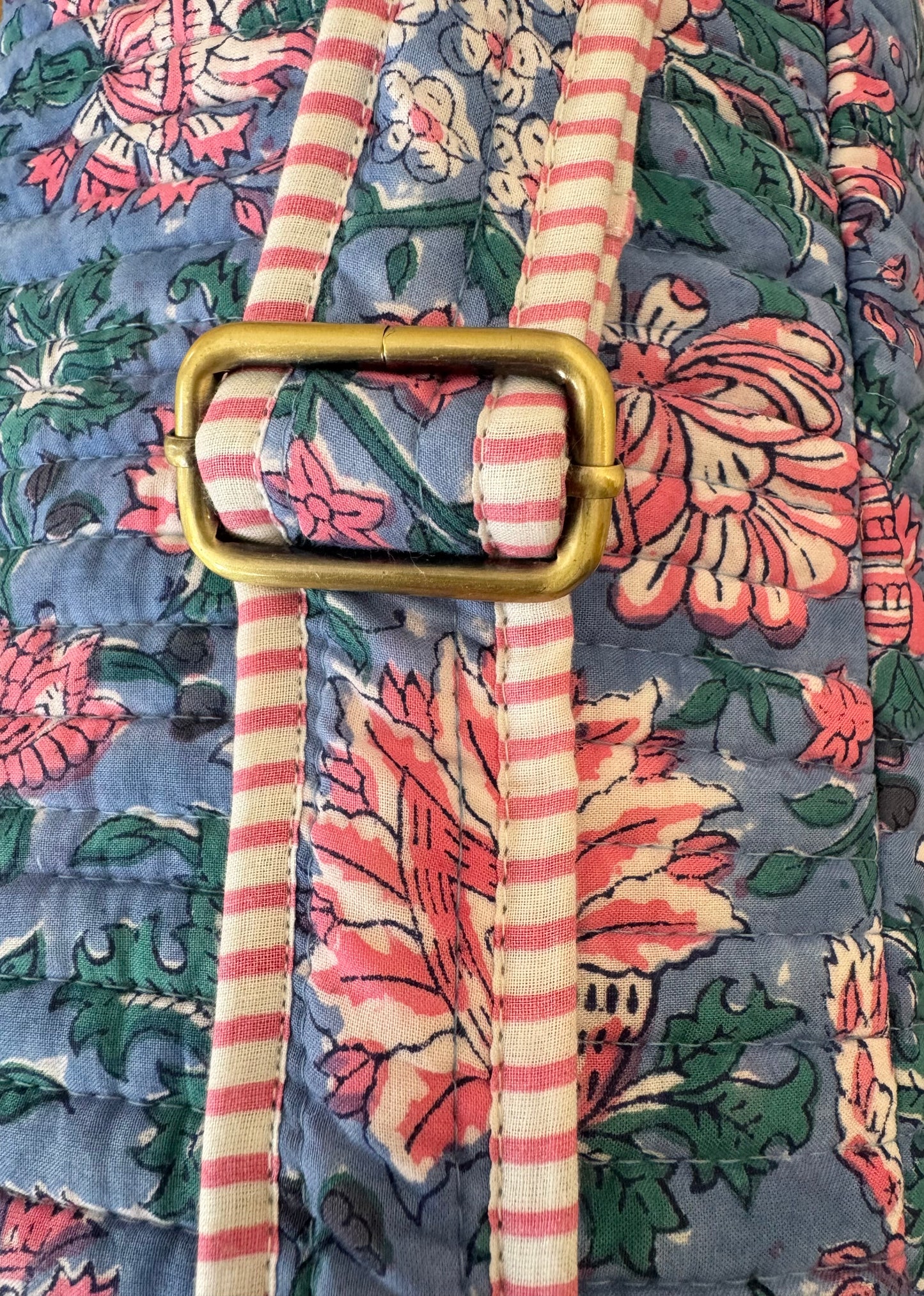 House of Mulmul - Blockprinted Yoga Mat Cover. Floral-patterned yoga mat bag with adjustable strap with a striped tie and gold buckle.