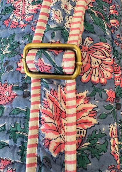 House of Mulmul - Blockprinted Yoga Mat Cover. Floral-patterned yoga mat bag with adjustable strap with a striped tie and gold buckle.