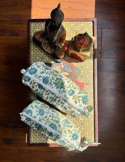 House of Mulmul - Cotton Quilted Makeup and Stationery Pouches. Decorative tray with pouches with a small statue on a wooden surface