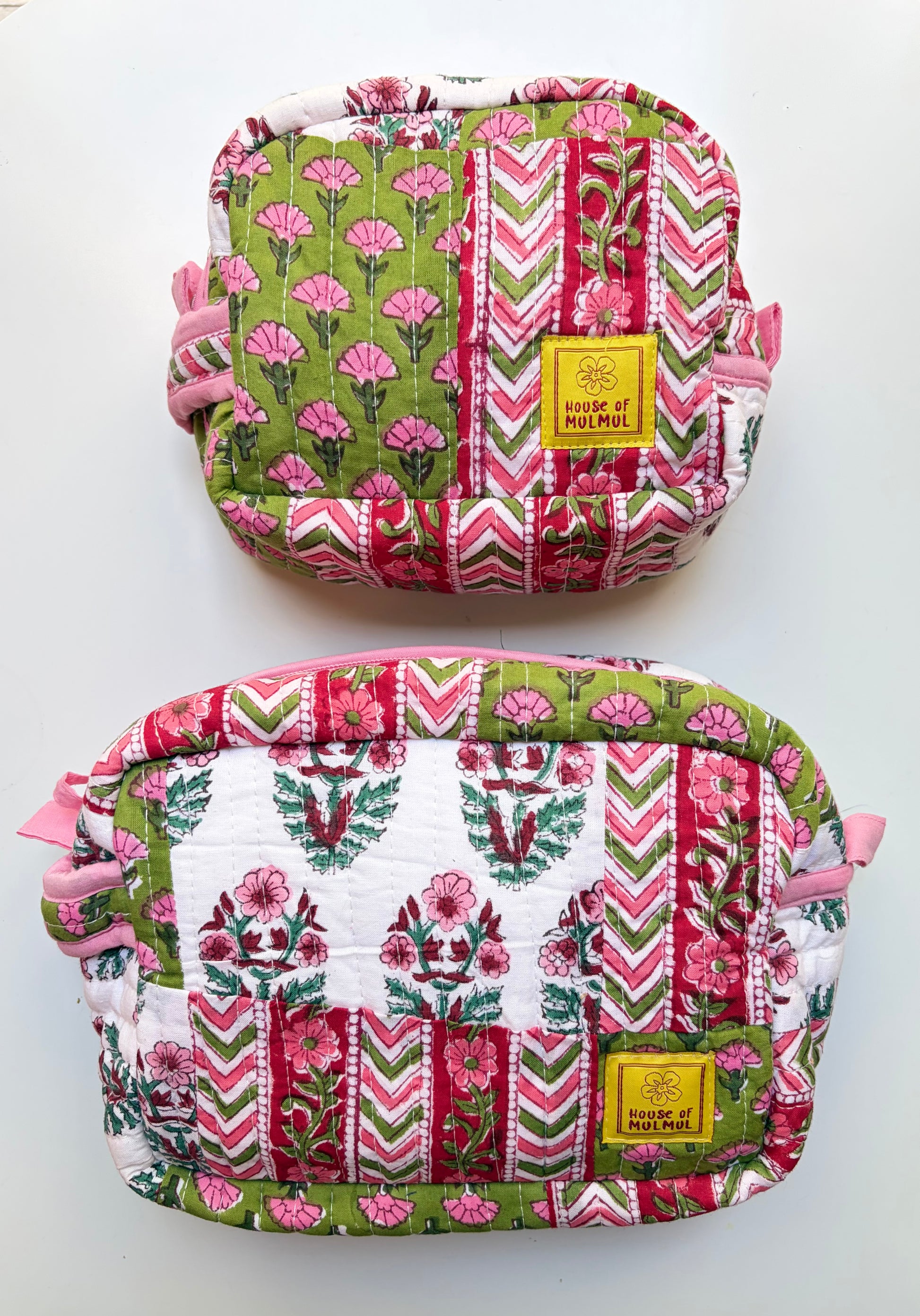 House of Mulmul - Handblock Printed Travel Makeup Quilted Pouch set. Two fabric pouches with colorful patterns on a white background