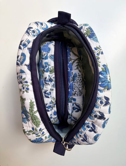 House of Mulmul - Handblock Printed Travel Makeup Quilted Pouch set. Floral-patterned fabric pouch with a zipper on a white background
