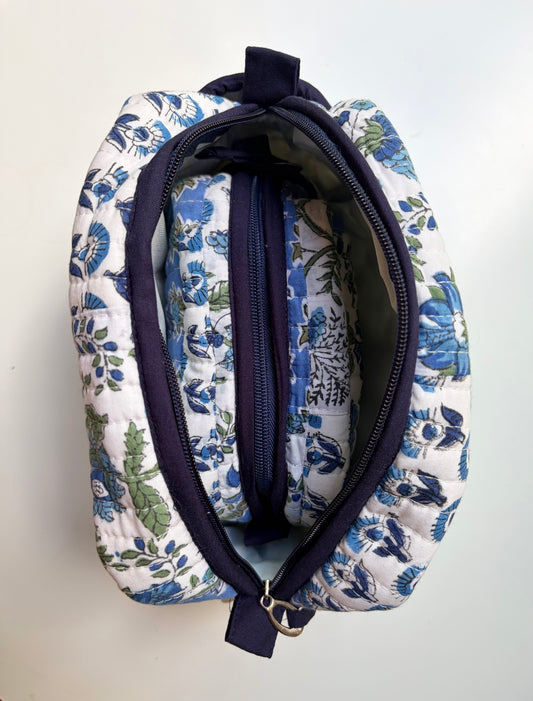House of Mulmul - Handblock Printed Travel Makeup Quilted Pouch set. Floral-patterned fabric pouch with a zipper on a white background