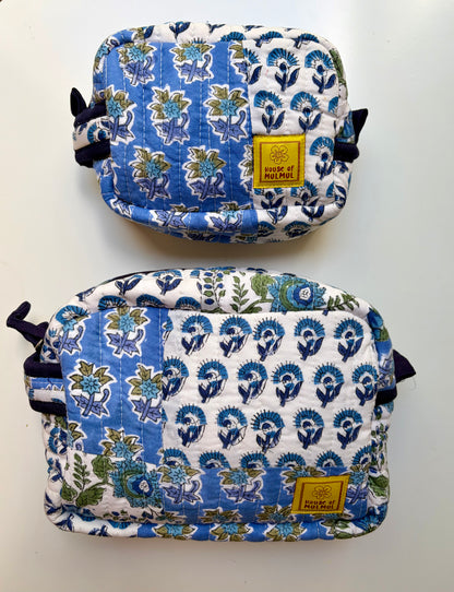 House of Mulmul - Handblock Printed Travel Makeup Quilted Pouch set. Two blue and white patterned bags with a visible brand label on a light gray background