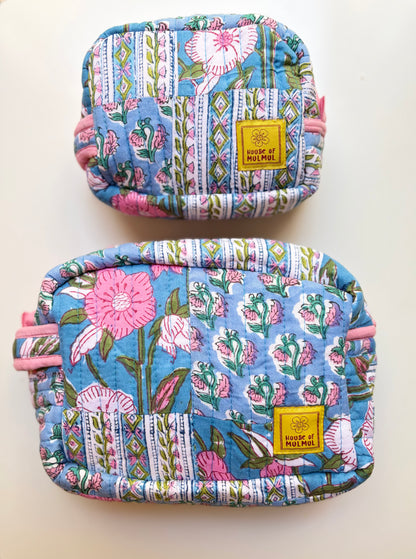 House of Mulmul - Handblock Printed Travel Makeup Quilted Pouch set. Two floral-patterned pouches with a visible brand label on a white background