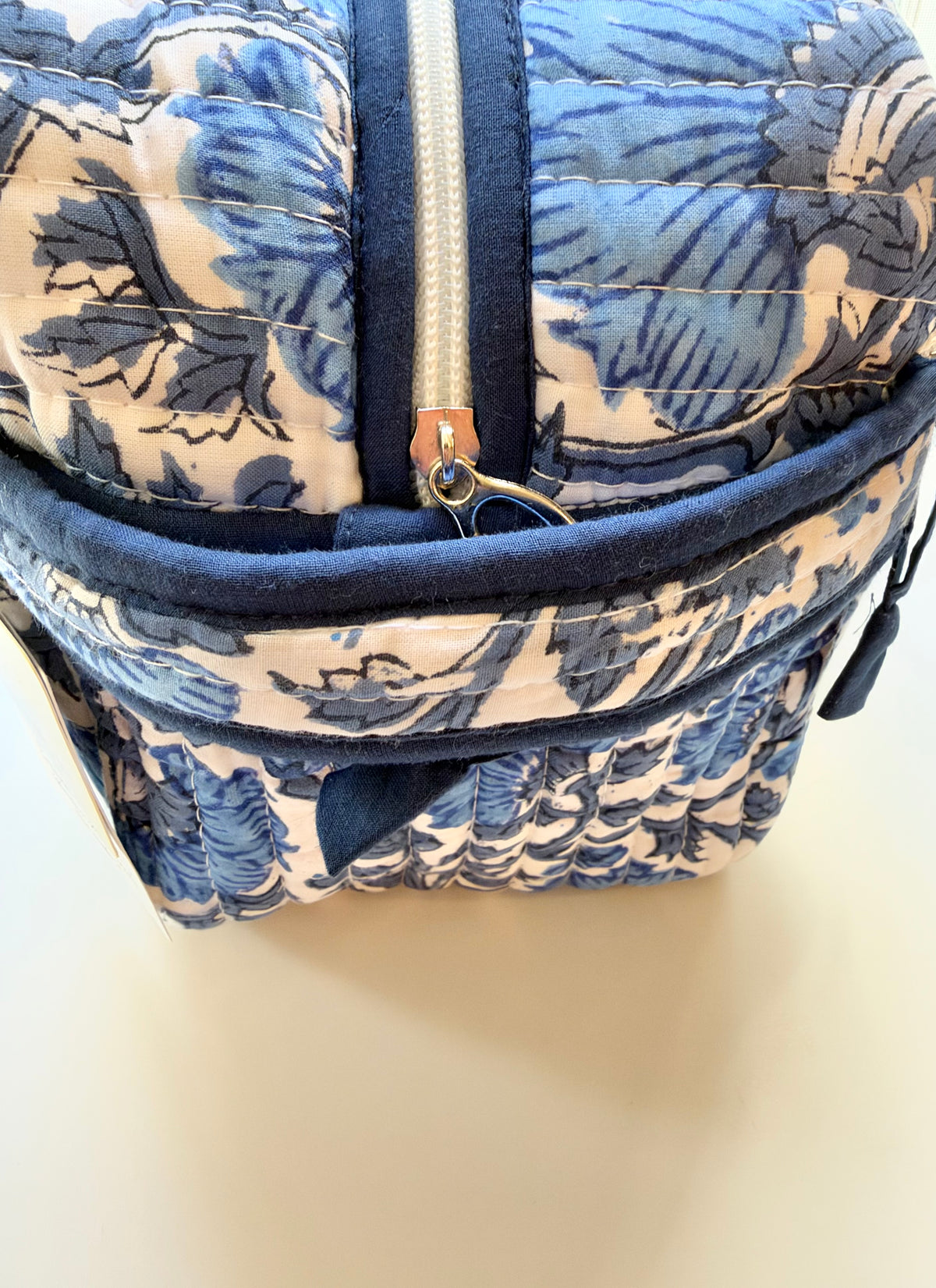 House of Mulmul - Quilted Blockprint Travel Makeup pouch set. Blue and white patterned pouch set with a zipper.