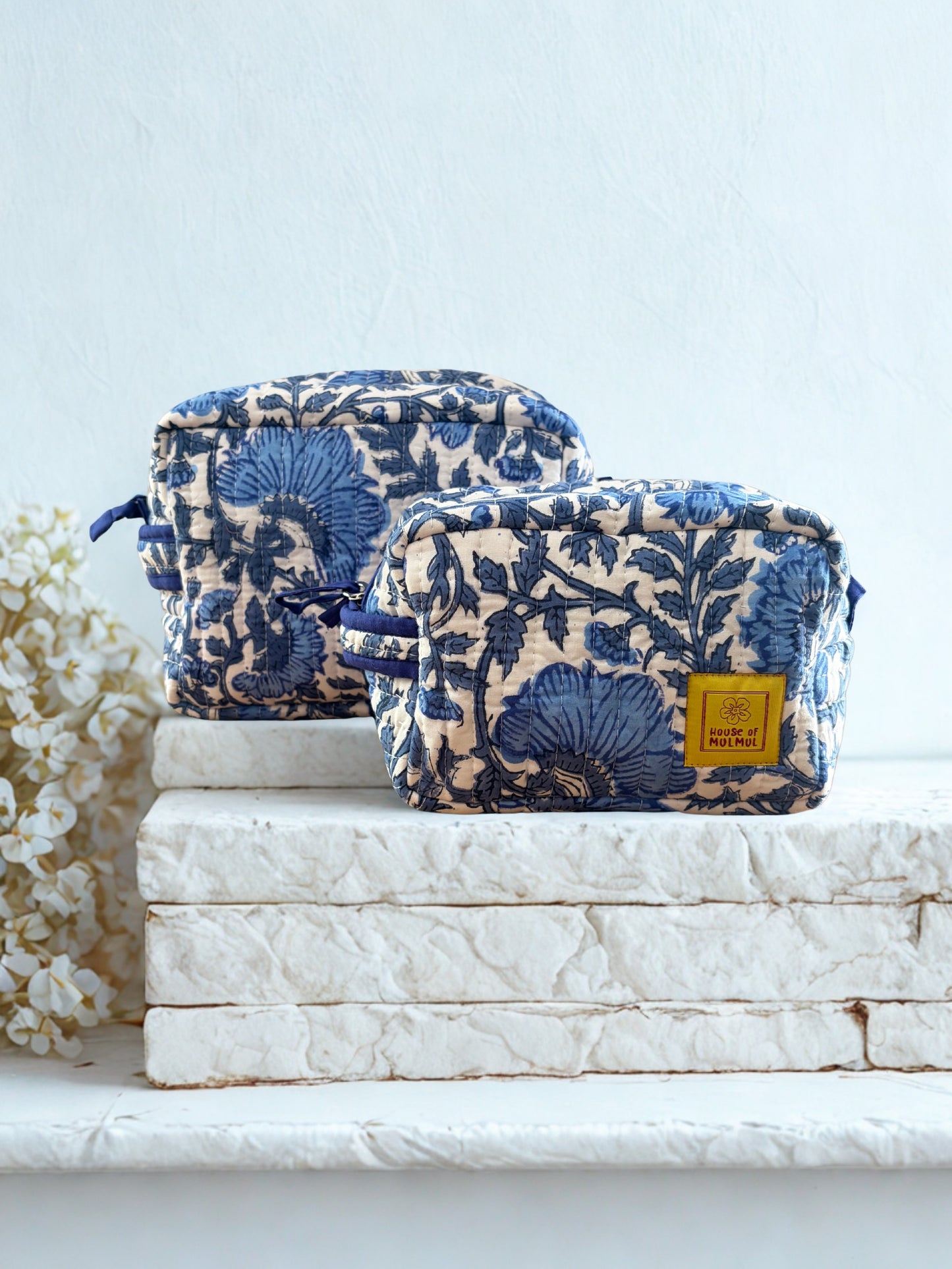House of Mulmul - Quilted Blockprint Travel Makeup pouch set. Blue and white patterned pouch set with a zipper.