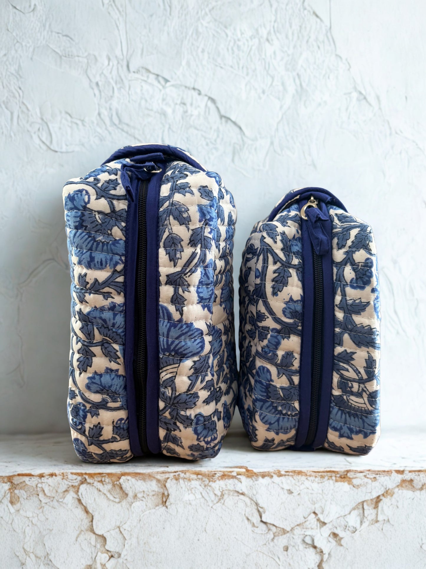 House of Mulmul - Quilted Blockprint Travel Makeup pouch set. Blue and white patterned pouch set with a zipper.