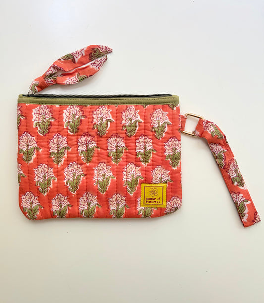 Hand Block Printed Quilted Travel Wristlet Pouch & Organizer. Floral patterned pouch with strap on a white background