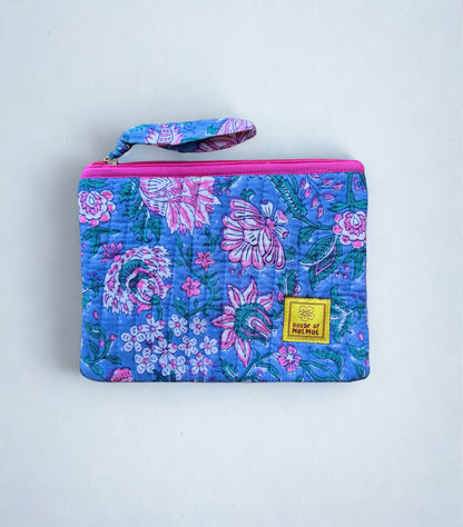 House of Mulmul - Quilted Flat Passport Pouch. Floral-patterned pouch with a visible brand label on a light gray background.