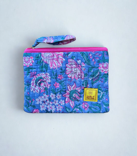 House of Mulmul - Quilted Flat Passport Pouch. Floral-patterned pouch with a visible brand label on a light gray background.