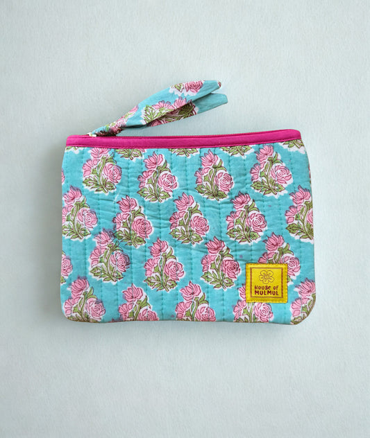 House of Mulmul - Quilted Flat Passport Pouch. Floral-patterned quilted pouch with a pink zipper on a white background.