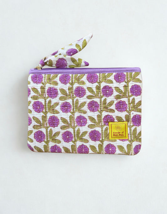 House of Mulmul - Quilted Flat Passport Pouch. Floral-patterned pouch with a yellow label on a white background