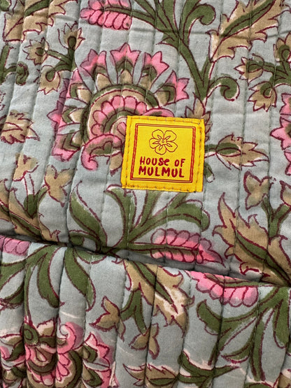 Floral patterned handblock printed fabric with a 'House of Mulmul' label.