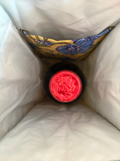 House of Mulmul - Quilted Wine Tote Bags. Nestled inside a white insulated bag with a yellow and blue floral patterned insert.