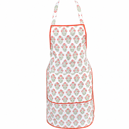 House of Mulmul - Blockprint Cotton Apron. A white apron with a repeating green and orange floral block print pattern and orange trim, shown against a plain white background.
