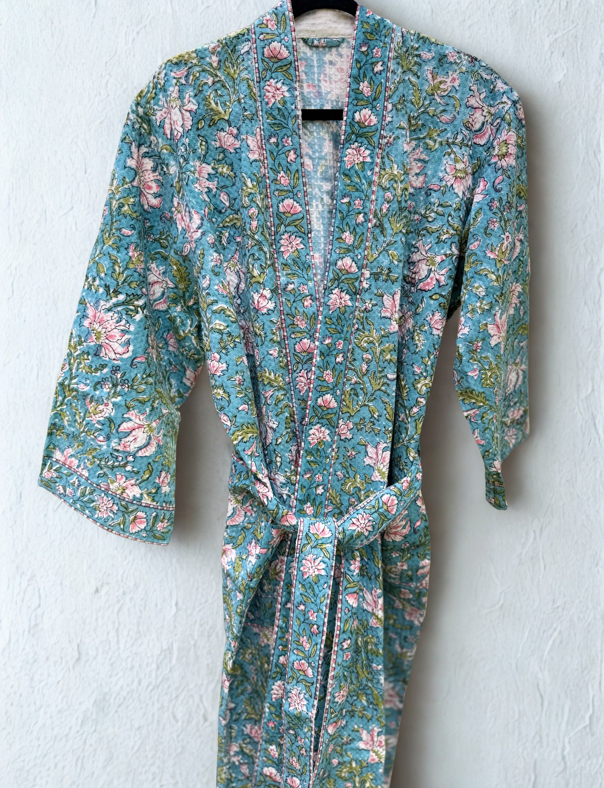 House of Mulmul - Blockprinted Cotton Bathrobe. Floral patterned robe on a white background