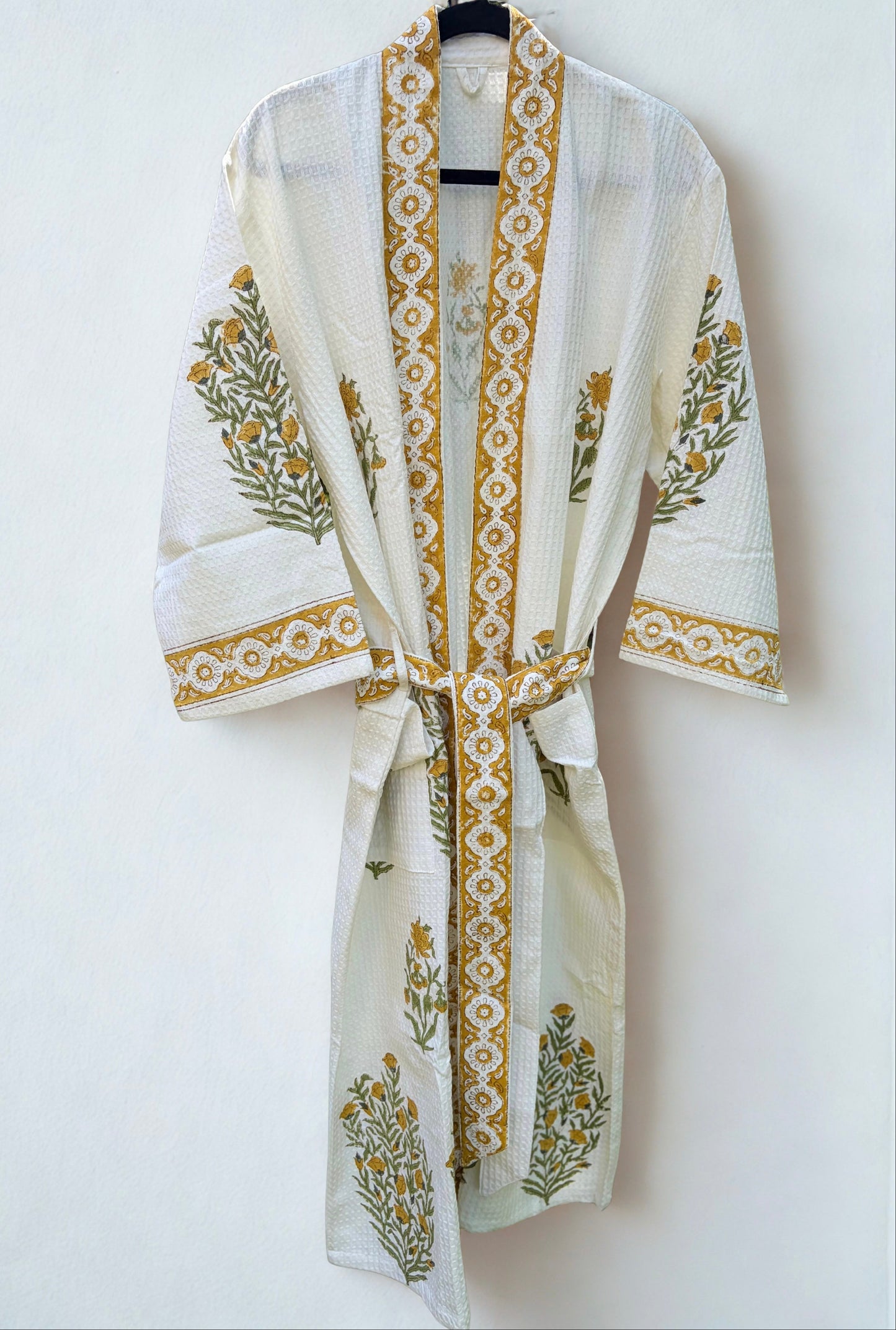 House of Mulmul - Blockprinted Cotton Bathrobe. White robe with gold blockprint on a white background