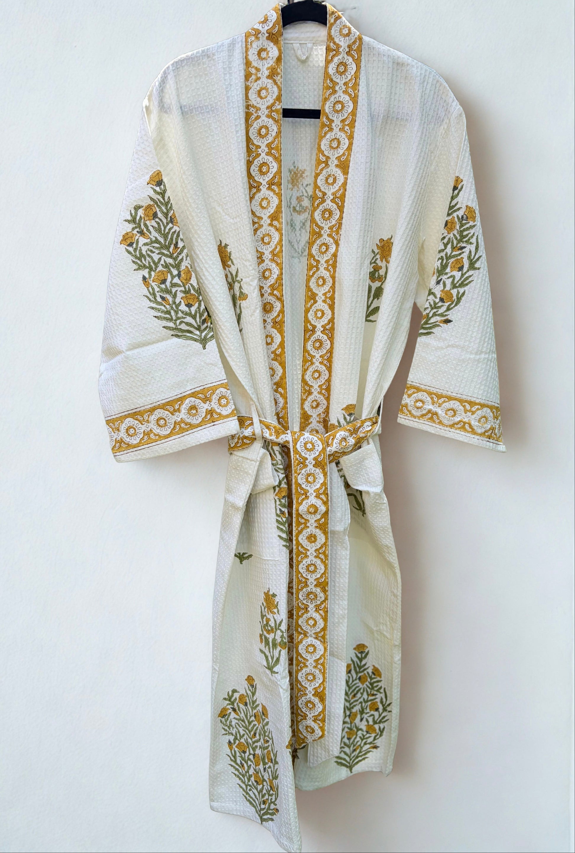 House of Mulmul - Blockprinted Cotton Bathrobe. White robe with gold blockprint on a white background