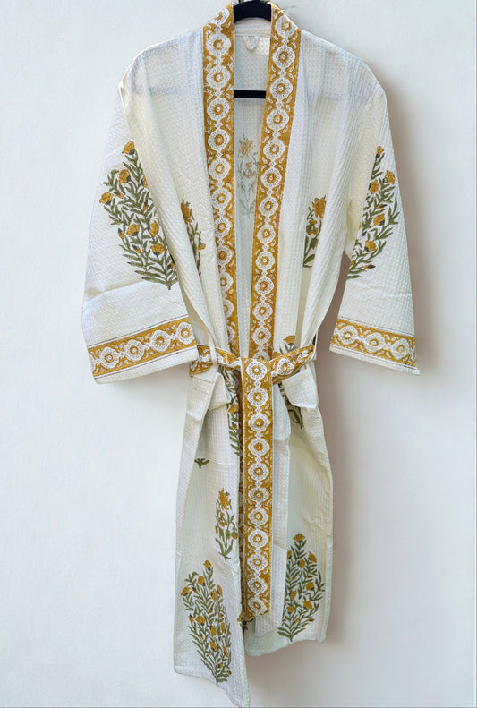 House of Mulmul - Blockprinted Cotton Bathrobe. White robe with gold blockprint on a white background