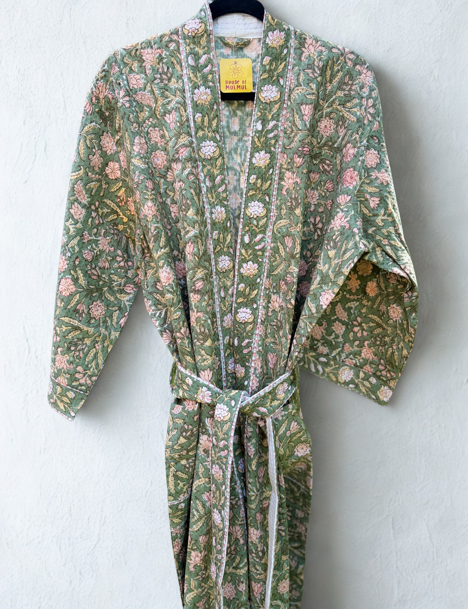 House of Mulmul - Blockprinted Cotton Bathrobe. Floral patterned robe on a white background