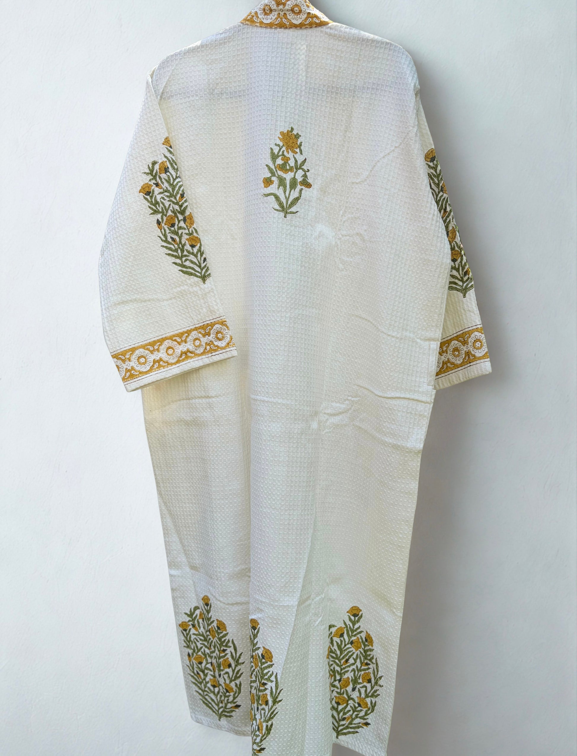 House of Mulmul - Blockprinted Cotton Bathrobe. White traditional bathrobe with floral blockprint on a white background