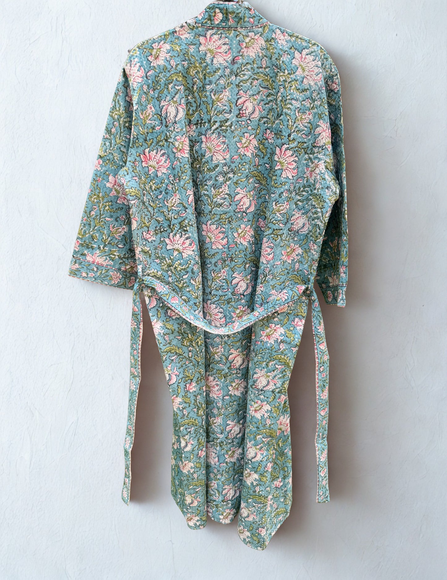 House of Mulmul - Blockprinted Cotton Bathrobe. Floral patterned robe on a white background